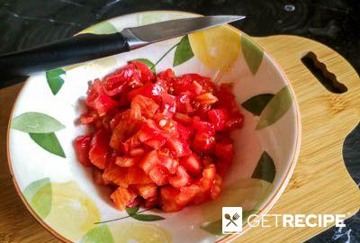 Кальмары в томатном соусе с оливками по-мароккански в тажине