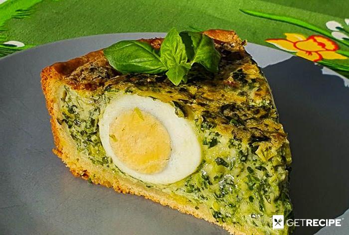Photo of Пасхальный пирог с яйцами и зеленью.