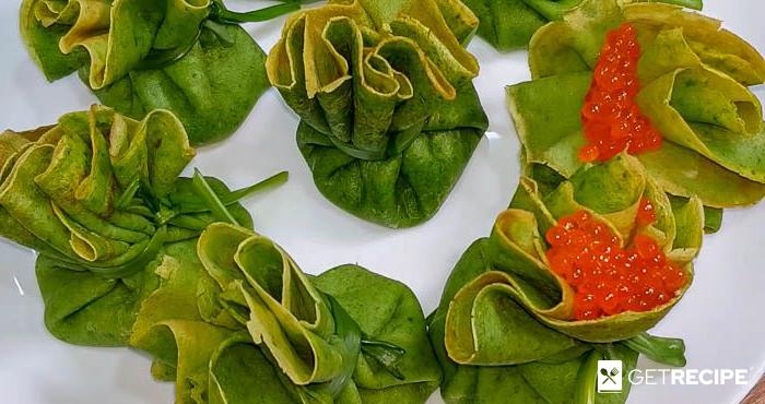 Photo of Зеленые блины с начинкой из сыра и селедки.